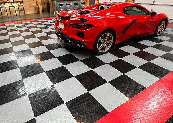 diamond garage tile Red Corvette parked in a garage with diamond garage tile