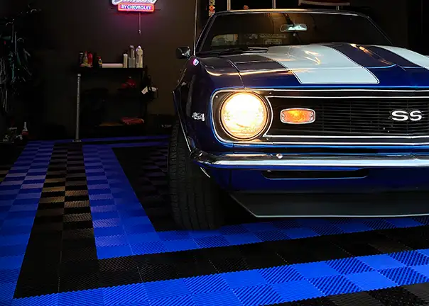 free flow garage tile with a with Camaro parked on it